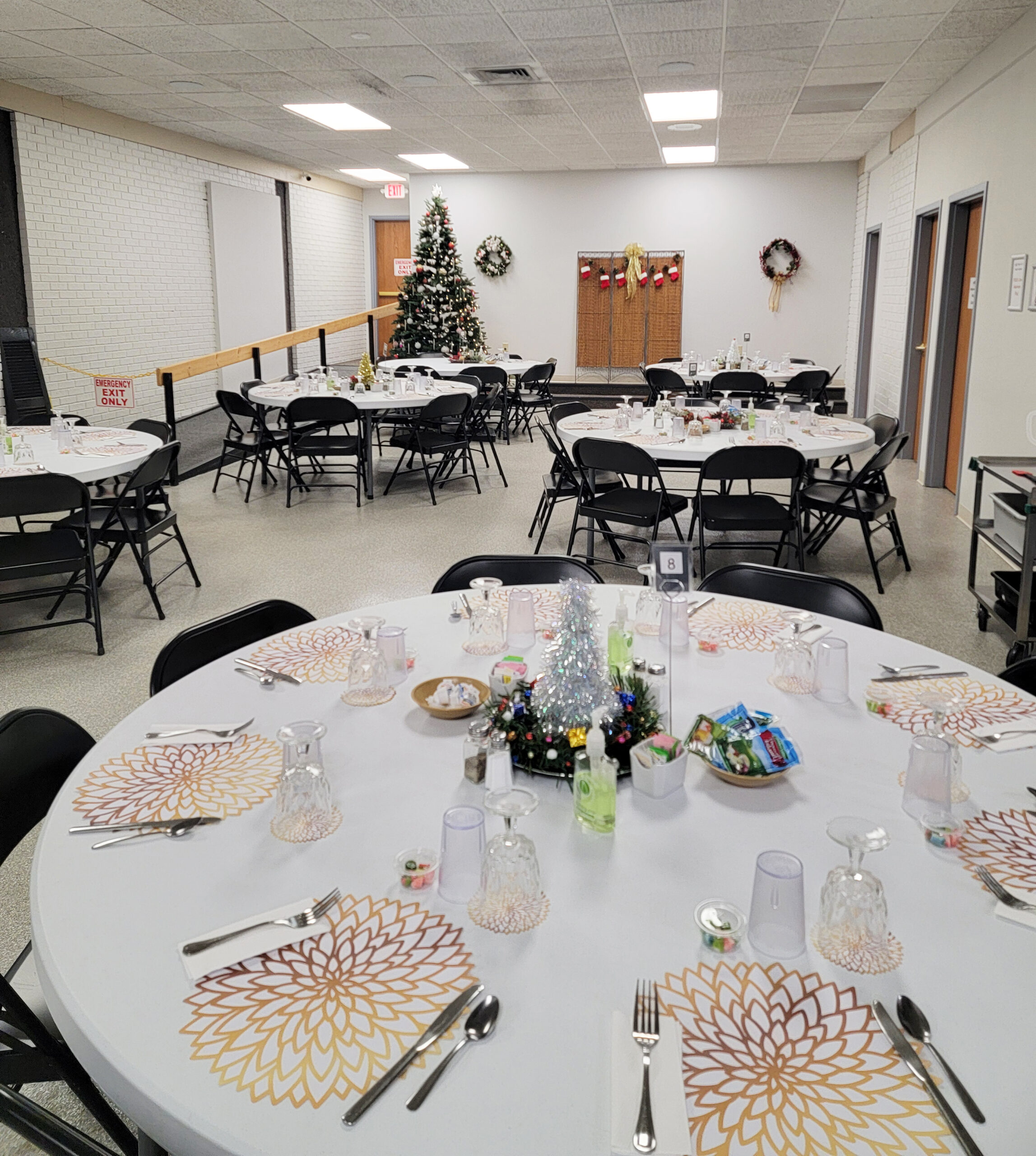 The dining room and tables are festively dressed in preparation of tonight's 21st Anniversary Meal.